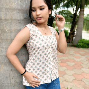 Home rayon printed sleeveless kurti with front slit – soft peach & multicolor motif