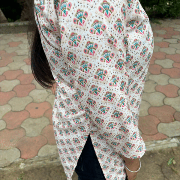 printed rayon v neck kurti with 3/4 sleeves – soft peach ethnic motif