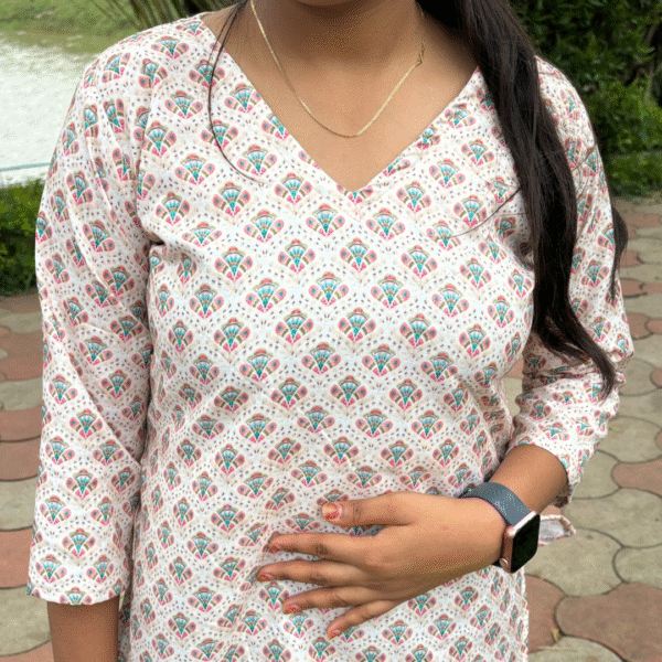 printed rayon v neck kurti with 3/4 sleeves – soft peach ethnic motif